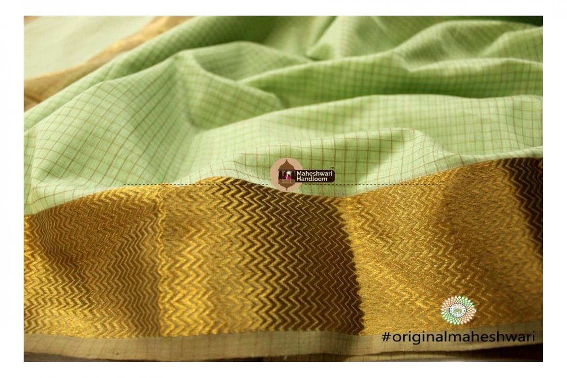 Maheshwari Sea Green Self Checks Body Saree